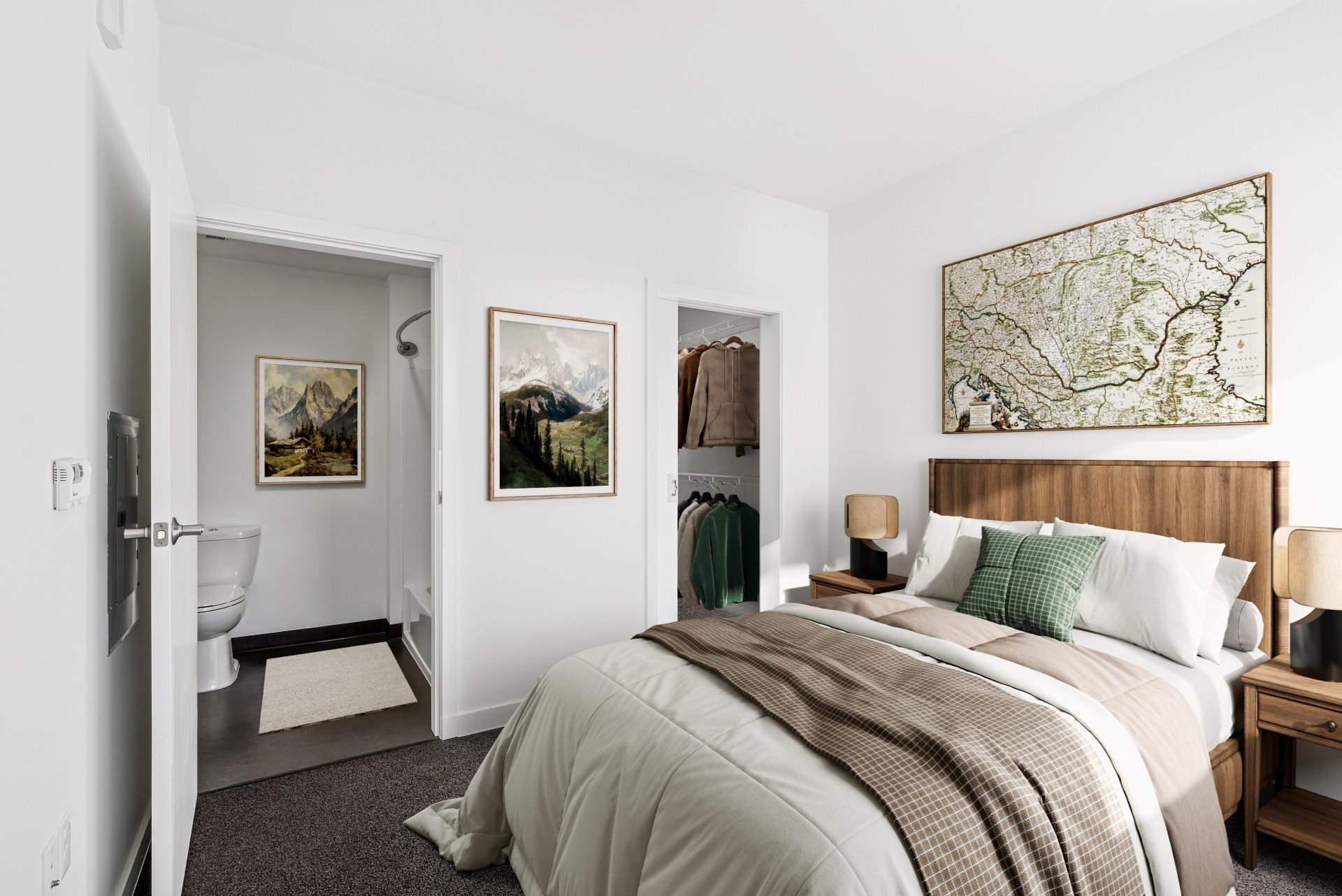 A bedroom with a large bed and a map on the wall.